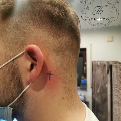 Neck tattoo- Cross